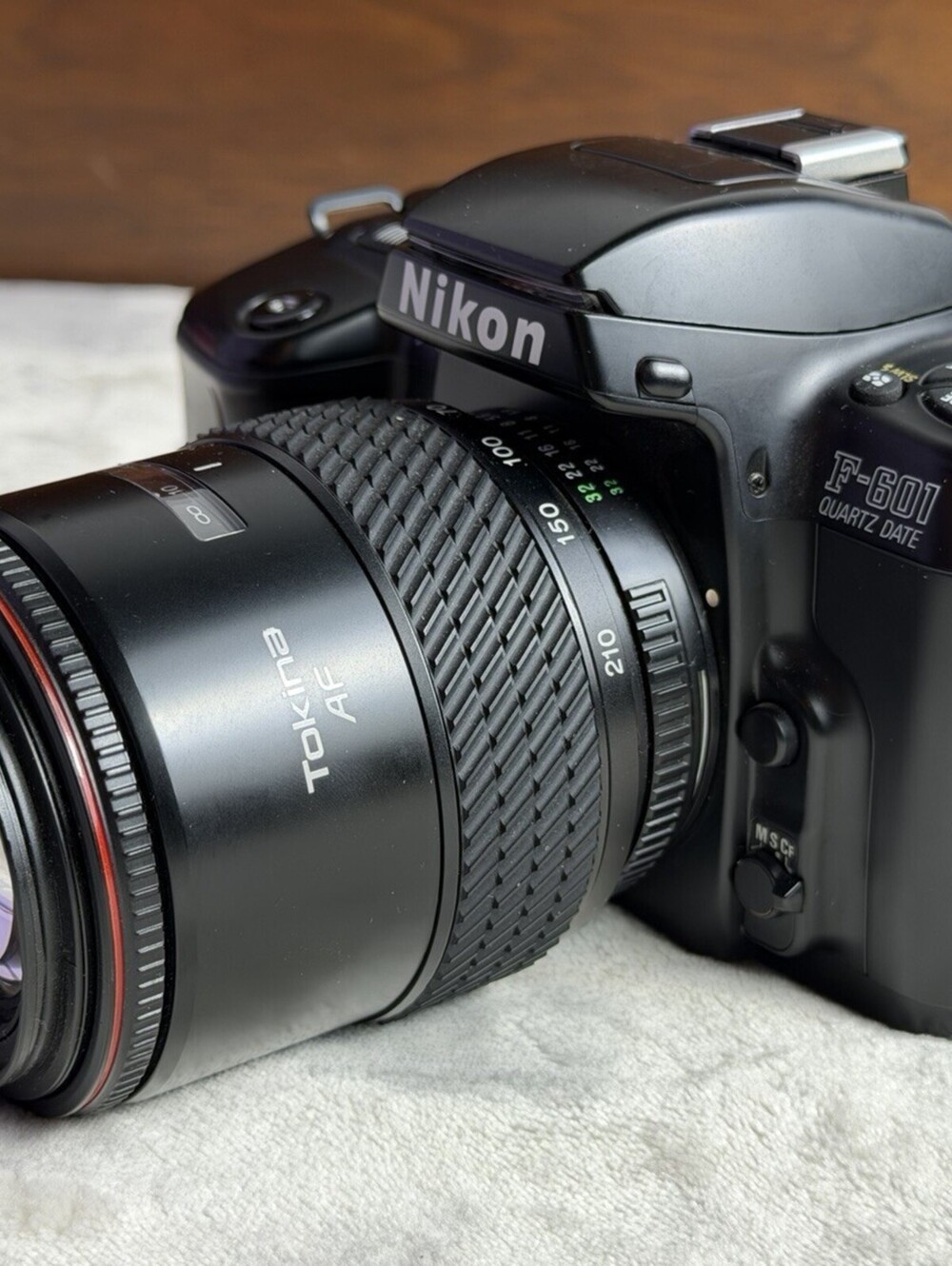 Nikon F-601 Quartz Date 35mm SLR Camera w/ Tokina AF 70-210mm f4-5.6 UNTESTED
